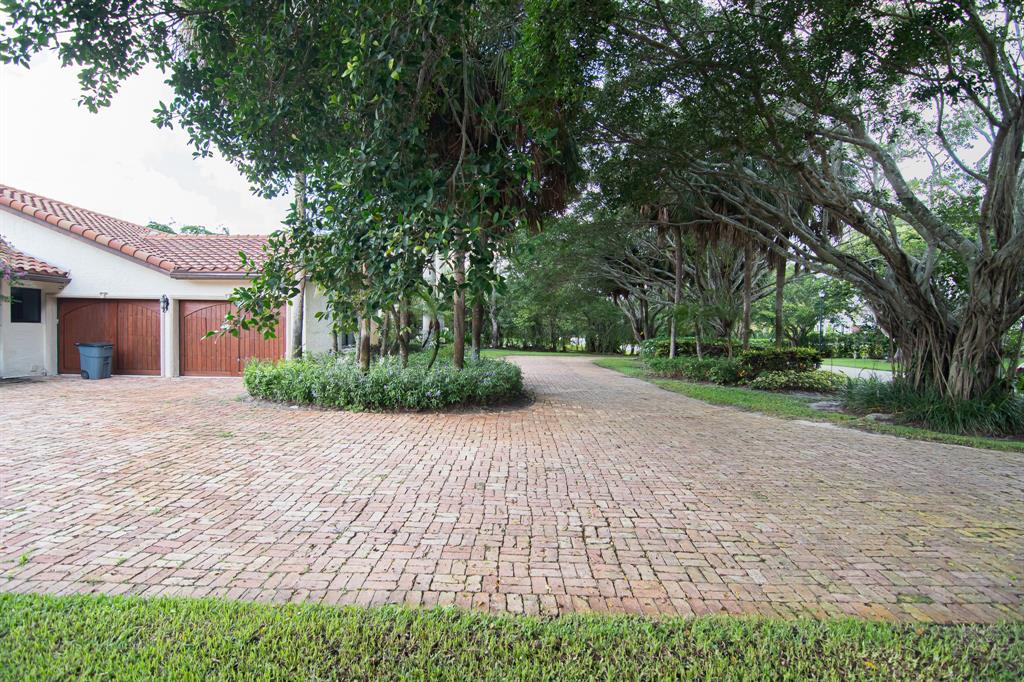 8208 Twin Lake Drive Boca Raton, FL 33496 - Photo 47 of 53 a view of a house with a street