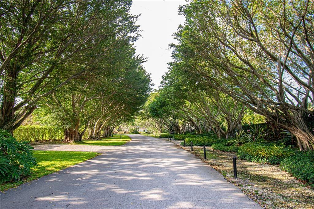 8208 Twin Lake Drive Boca Raton, FL 33496 - Photo 53 of 53 a view of green space with yard