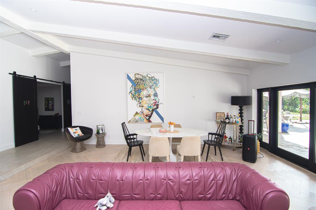 8208 Twin Lake Drive Boca Raton, FL 33496 - Photo 7 of 53 a living room with furniture a rug and white walls