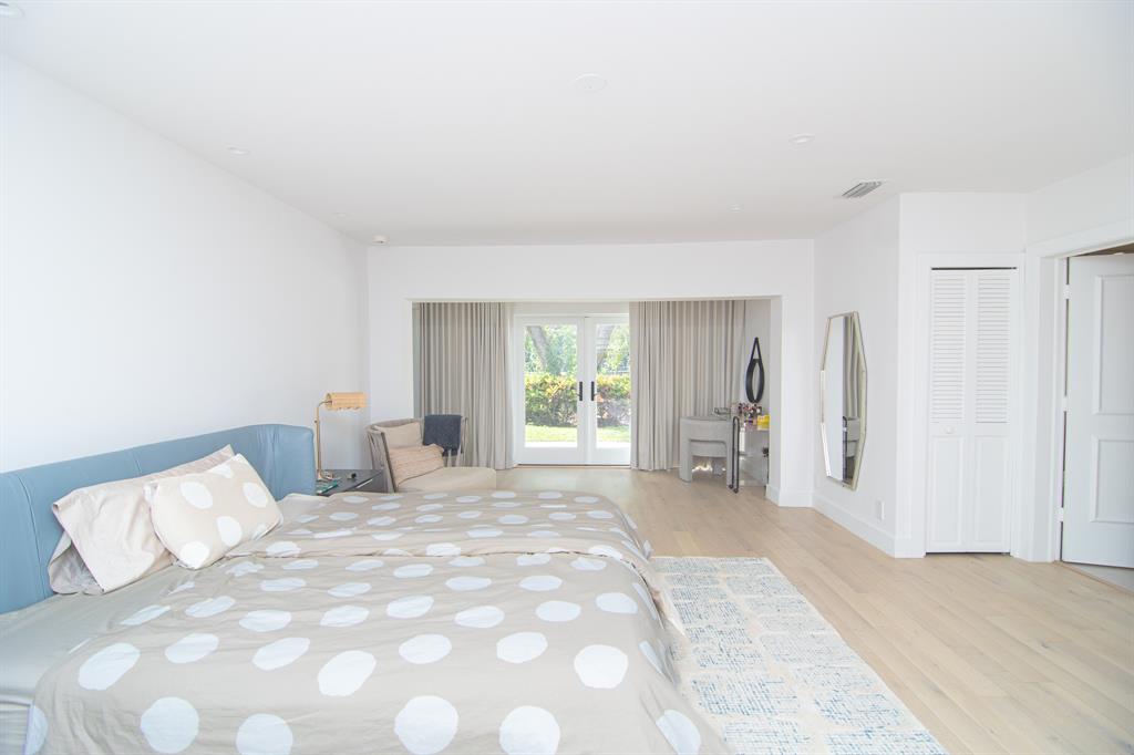 8208 Twin Lake Drive Boca Raton, FL 33496 - Photo 10 of 53 a large white bed in a white room