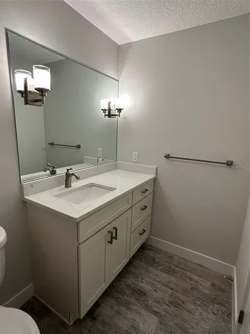 a view of a chandelier fan in a room
