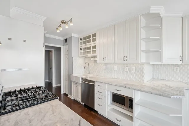 a view of cabinets and window