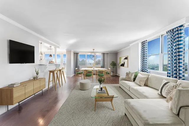 a bedroom with a bed and couch