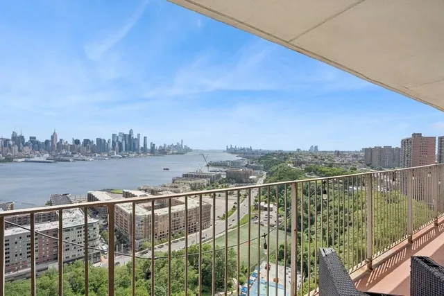 a view of city from a balcony