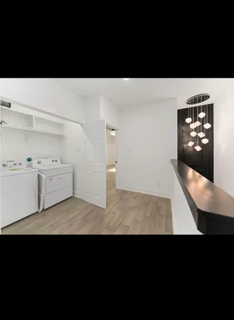 a black and white photo of a living room