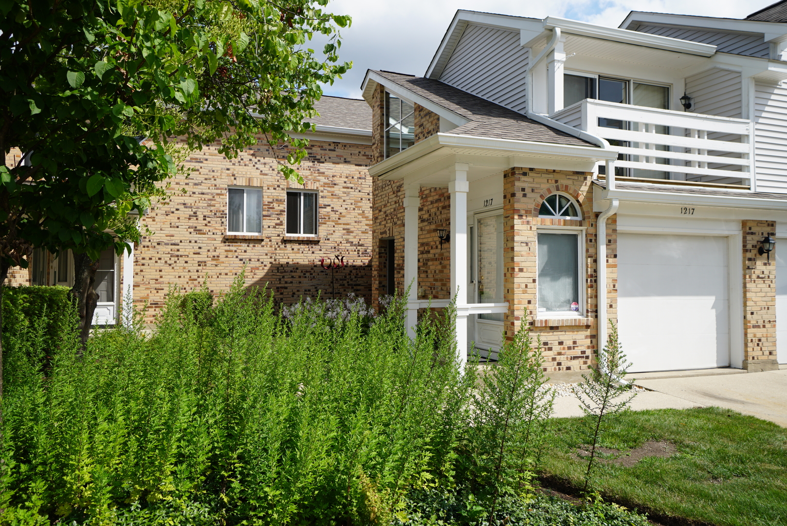 1217 Ranchview Court Buffalo Grove, IL 60089 - Photo 1 of 16 front view of a house with a yard