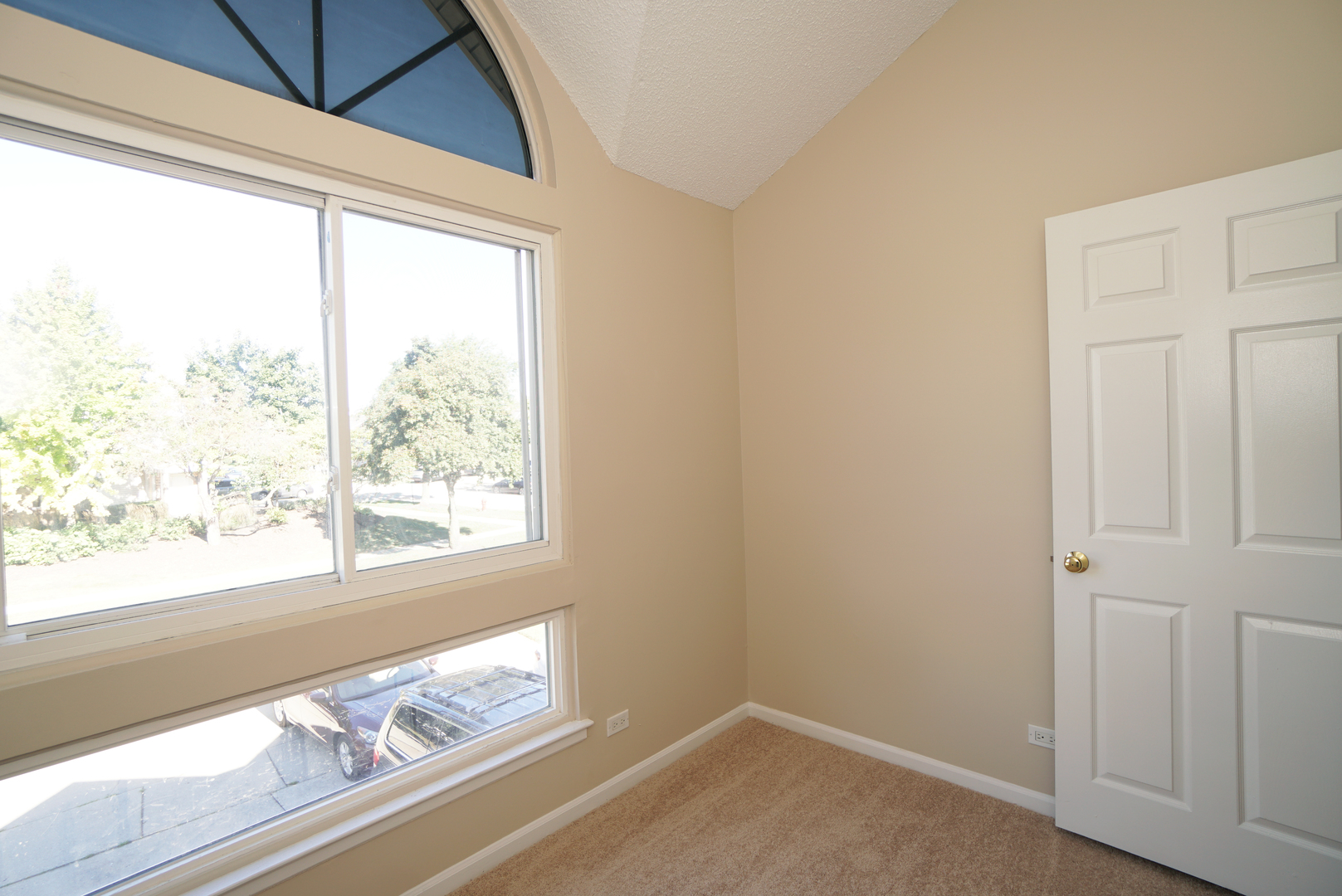 1217 Ranchview Court Buffalo Grove, IL 60089 - Photo 13 of 16 a view of an empty room and window