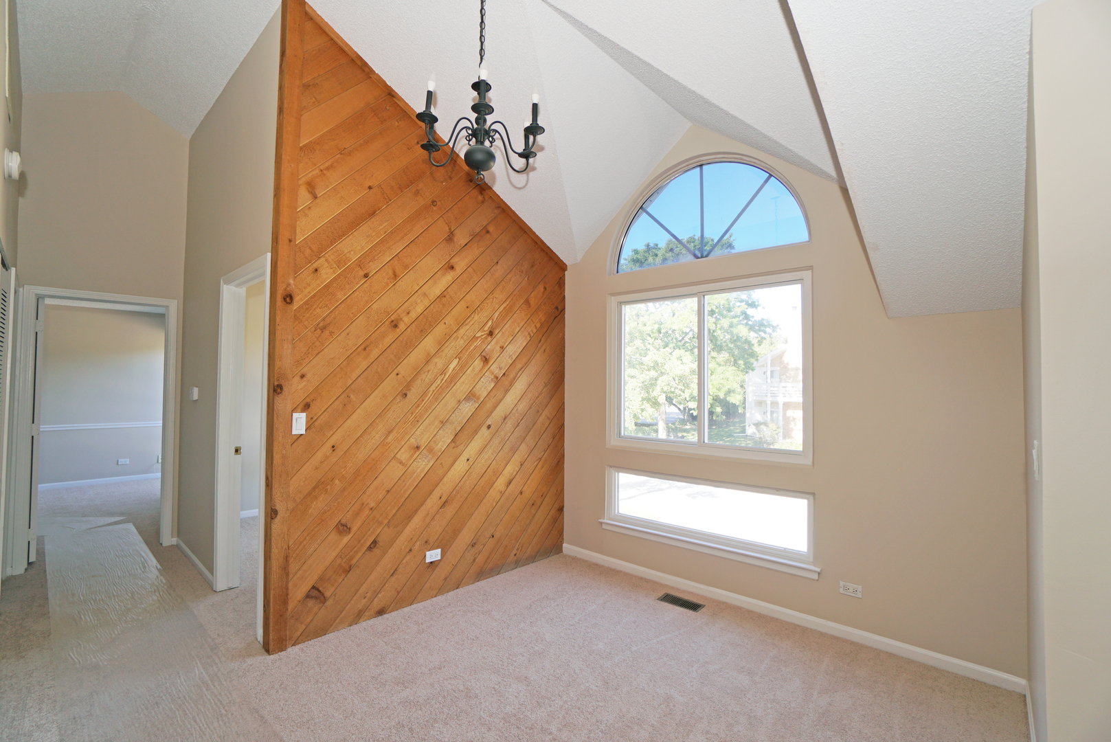 1217 Ranchview Court Buffalo Grove, IL 60089 - Photo 6 of 16 an empty room with windows and door