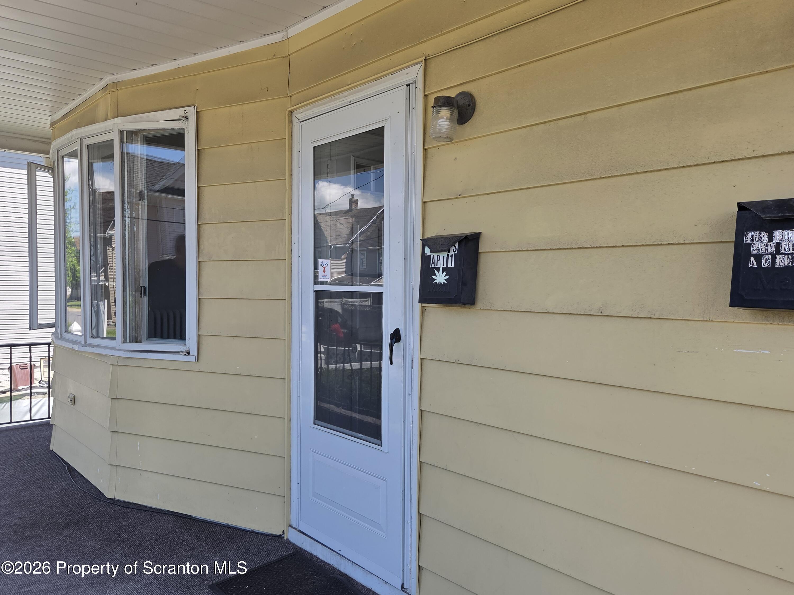 409 Butler Street Dunmore, PA 18512 - Photo 5 of 33 Covered front porch