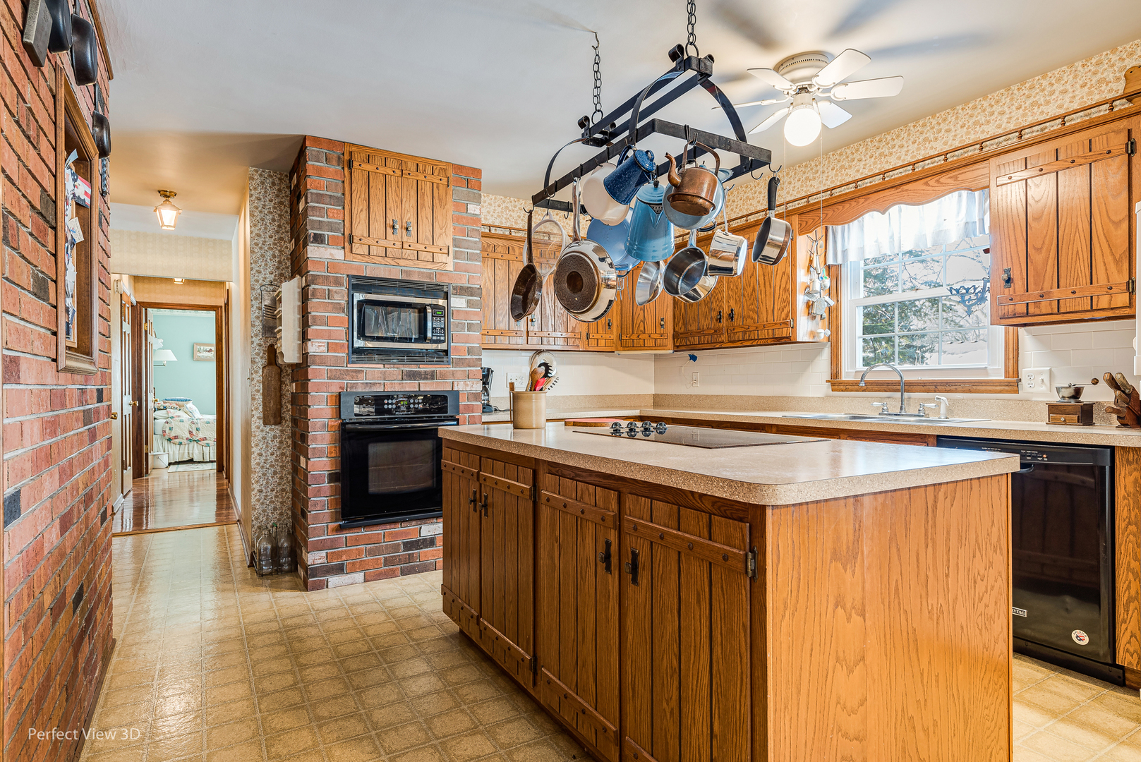 313 Alschuler Drive Aurora, IL 60506 - Photo 12 of 23 a kitchen with stainless steel appliances granite countertop a stove and a sink