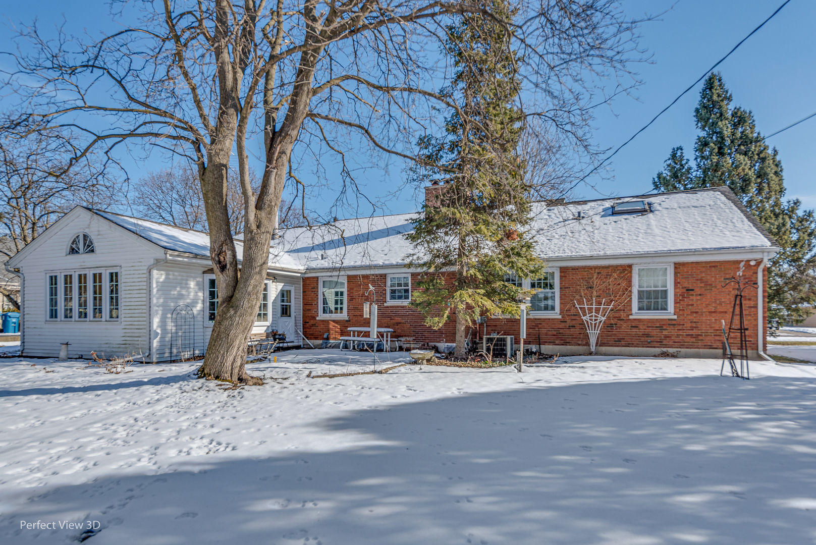 313 Alschuler Drive Aurora, IL 60506 - Photo 3 of 23 a view of a house with a tree in front