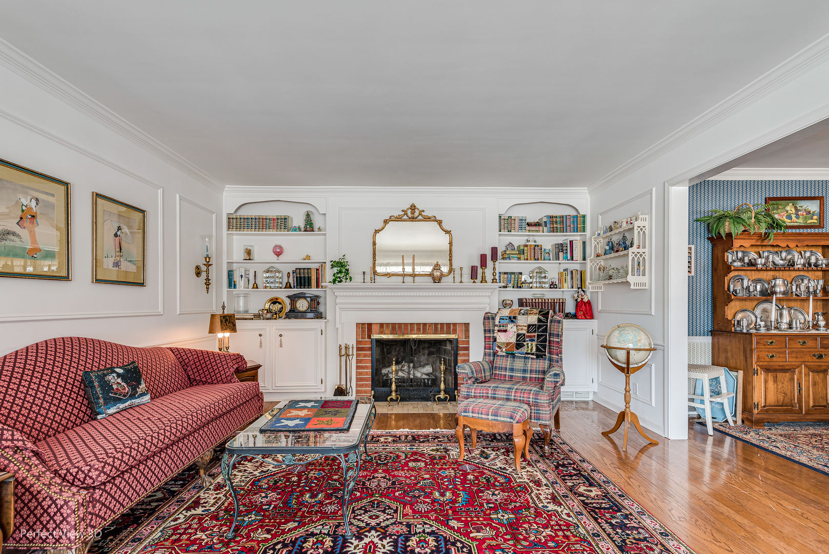 313 Alschuler Drive Aurora, IL 60506 - Photo 5 of 23 a living room with furniture a rug and a fireplace