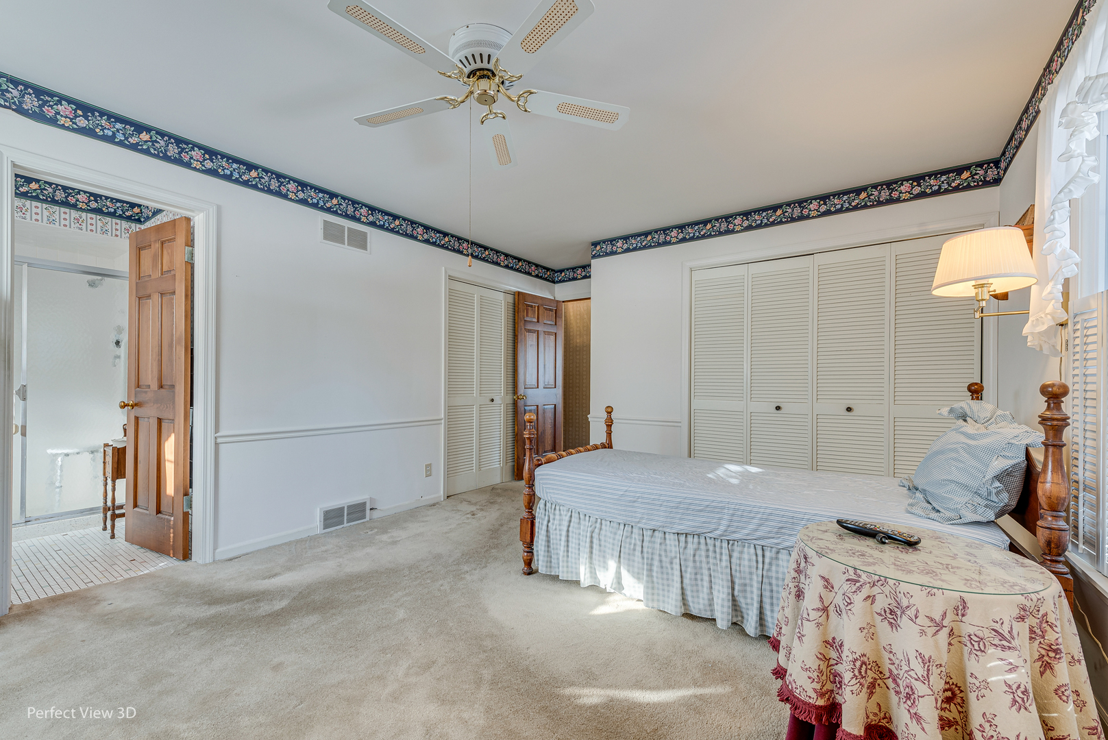 313 Alschuler Drive Aurora, IL 60506 - Photo 10 of 23 a bedroom with a bed and a chandelier