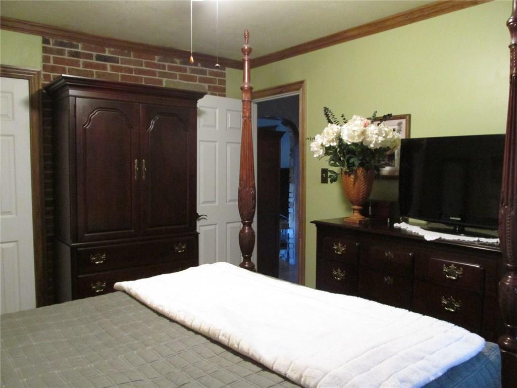 392 Maple Summit Road Mill Run, PA 15464 - Photo 11 of 25 Off to the back left is the closet. You can just get a peek into the living through the open door way.