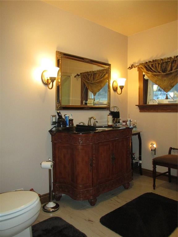 392 Maple Summit Road Mill Run, PA 15464 - Photo 14 of 25 Now that's an upgraded vanity! This time the tile is marble and not ceramic! There's a soaking tub to the right. Let's take a look at that third bedroom.