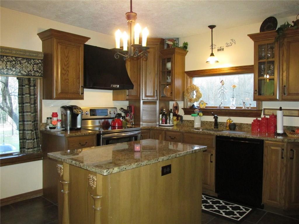 392 Maple Summit Road Mill Run, PA 15464 - Photo 3 of 25 If you could only see the "before renovation" pictures! That's a Bosch dishwasher to the right. Those are solid oak custom cabinets and hardware!