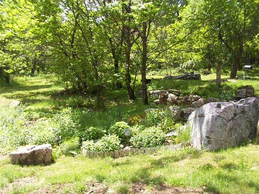 392 Maple Summit Road Mill Run, PA 15464 - Photo 24 of 25 Just up from the back deck you'll find this herb garden. When you get to the top of the parcel you'll find huge boulders!