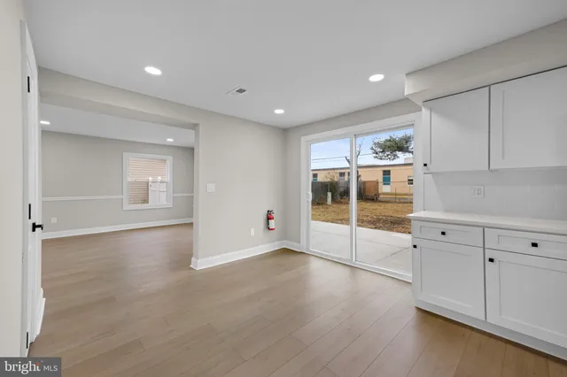 a large kitchen with cabinets
