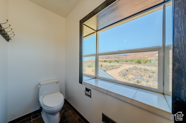 6178 East Zion Road Kanab, UT 84741 - Photo 27 of 48 Bathroom with toilet and baseboards