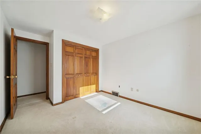 an empty room with closet