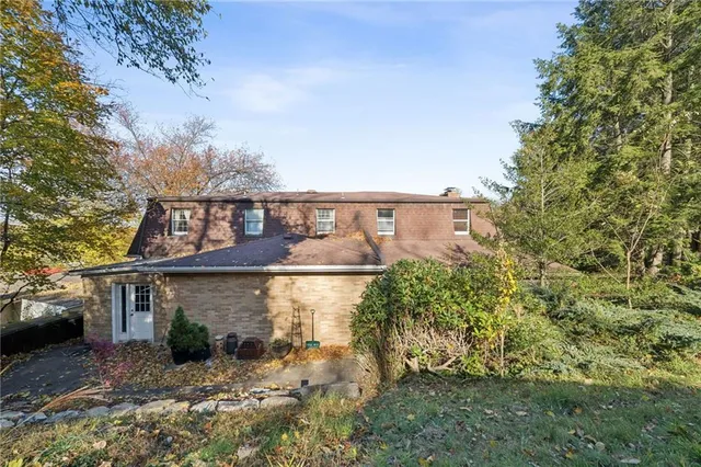 a view of a lake with a building in the background