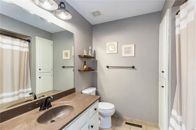 $475,000 | 7203 Northwest Eastside Drive, Weatherby Lake, MO 64152