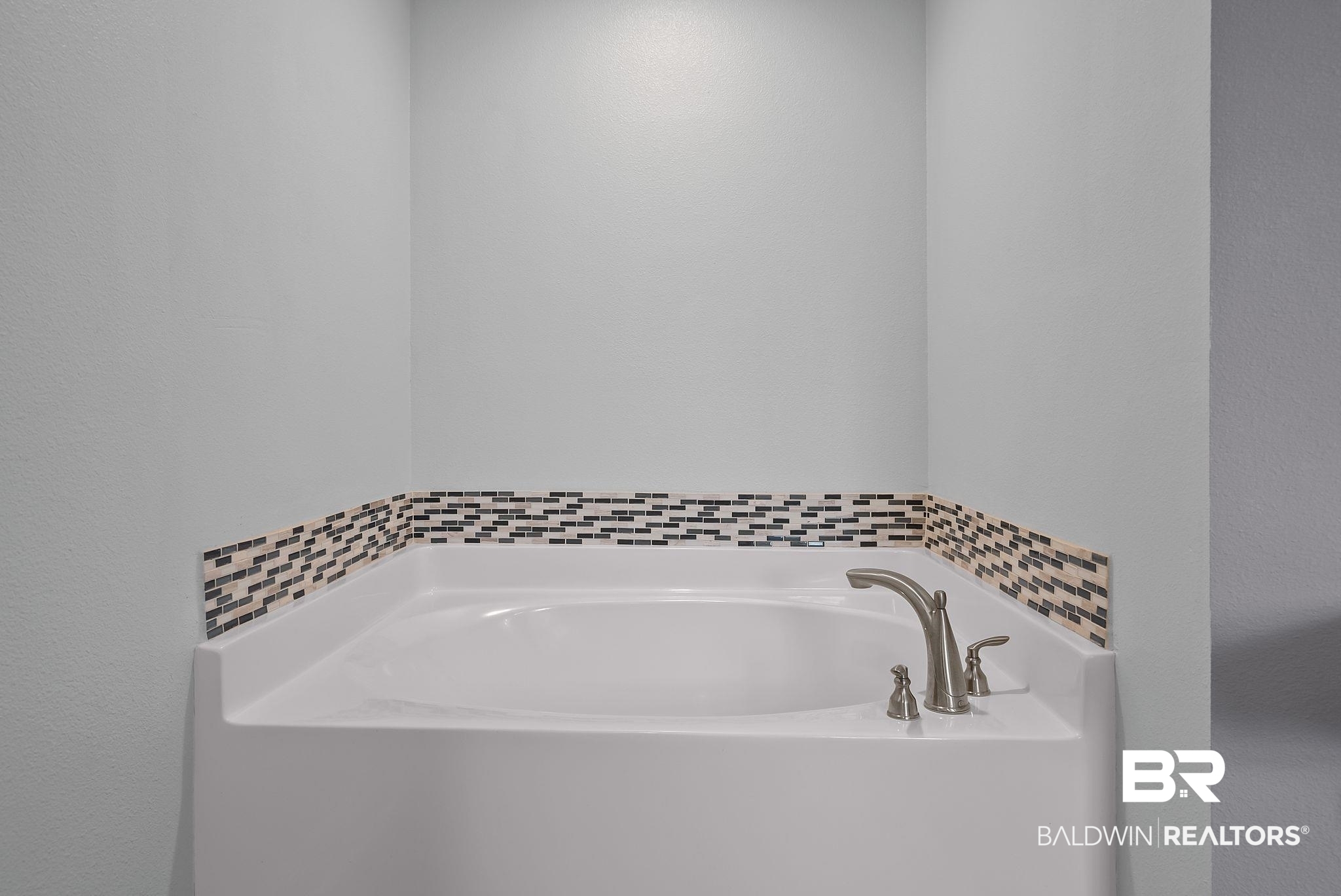 22076 Garland Loop Silverhill, AL 36576 - Photo 14 of 27 Soaking tub with brushed nickel fixtures