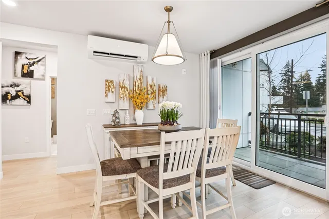 a view of a dining room with furniture window and outside view