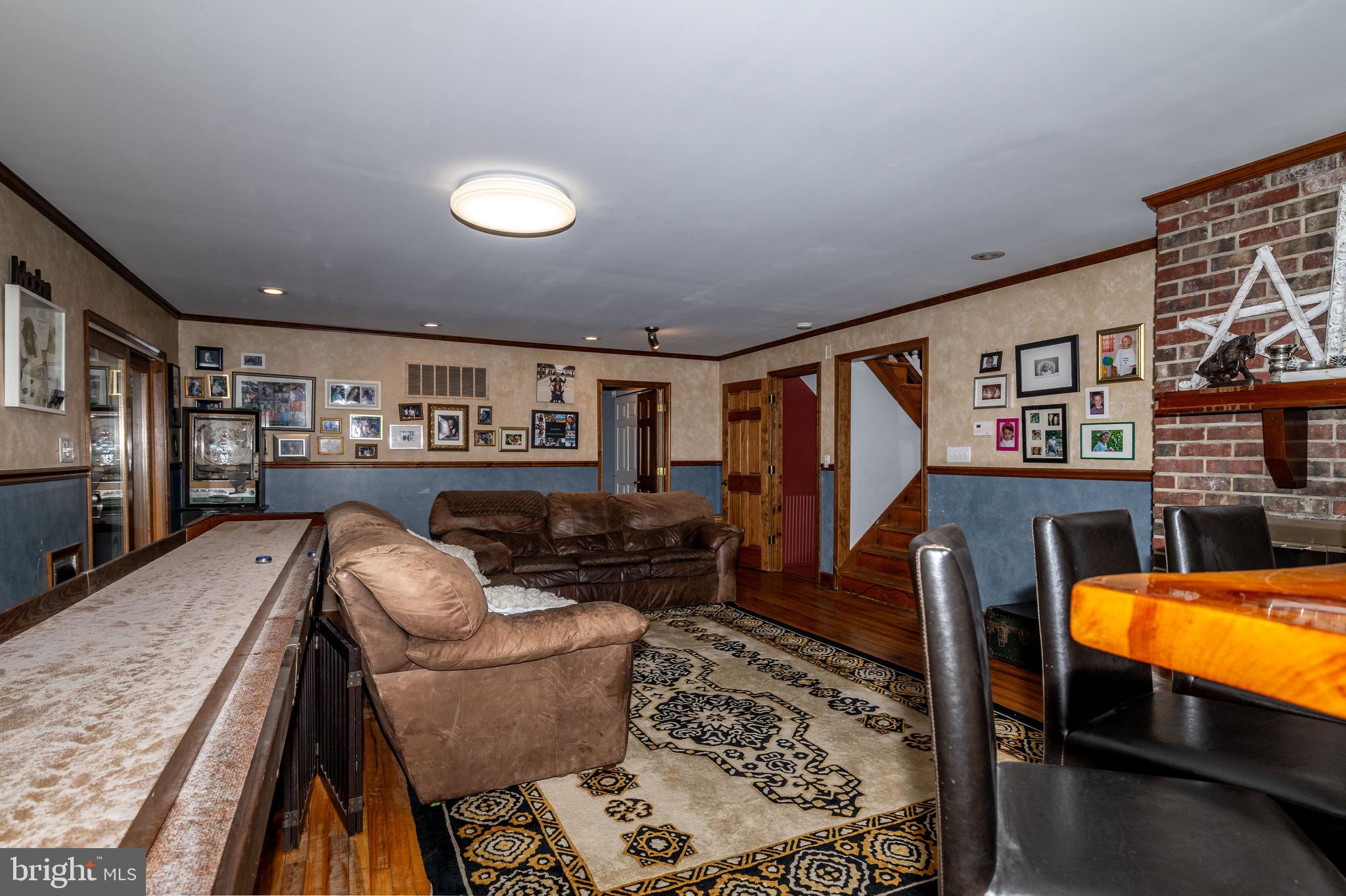 98 Nantucket Trail Medford, NJ 08055 - Photo 25 of 69 a living room with furniture and a flat screen tv