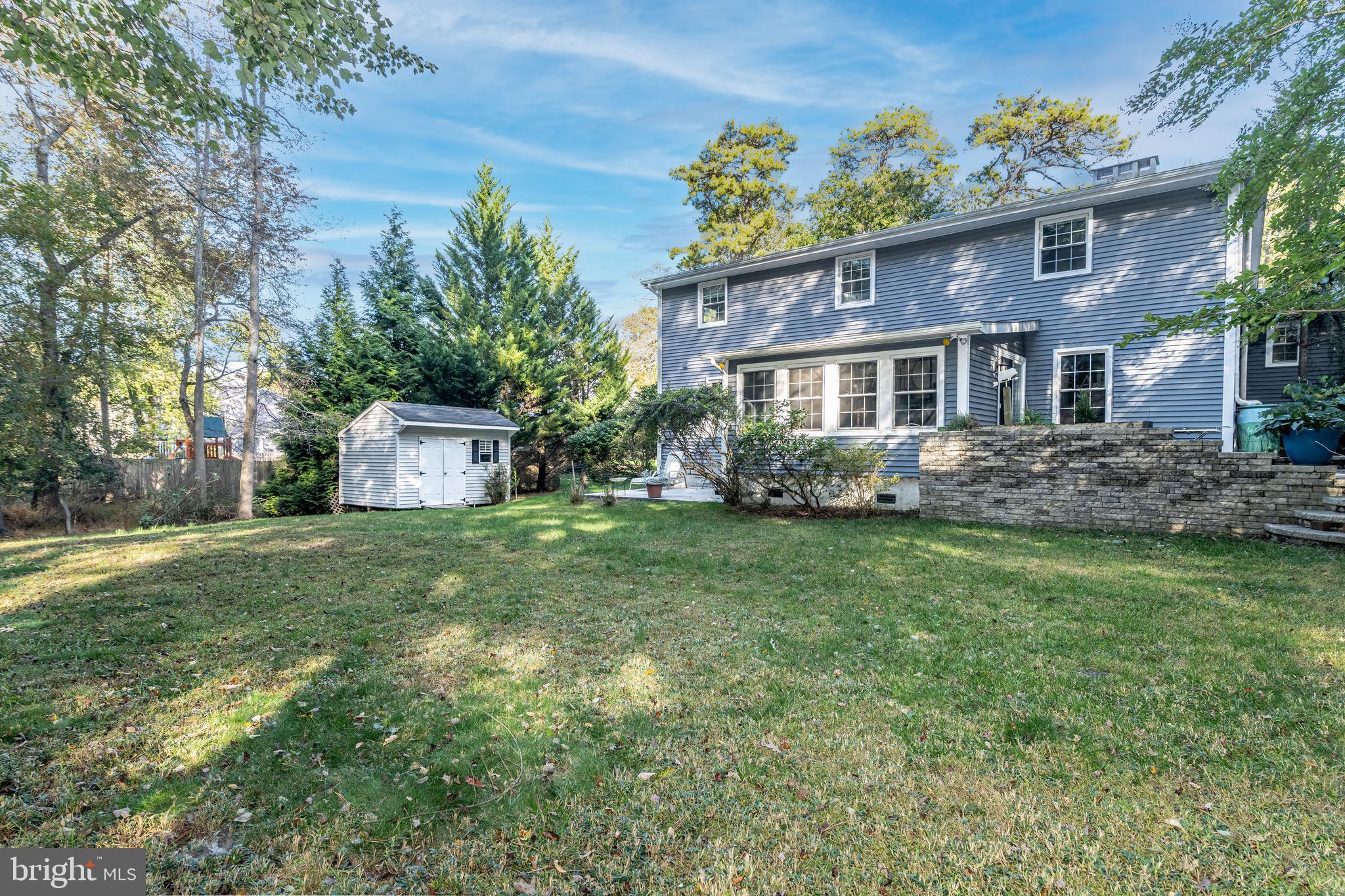 98 Nantucket Trail Medford, NJ 08055 - Photo 46 of 69 a front view of a house with a garden