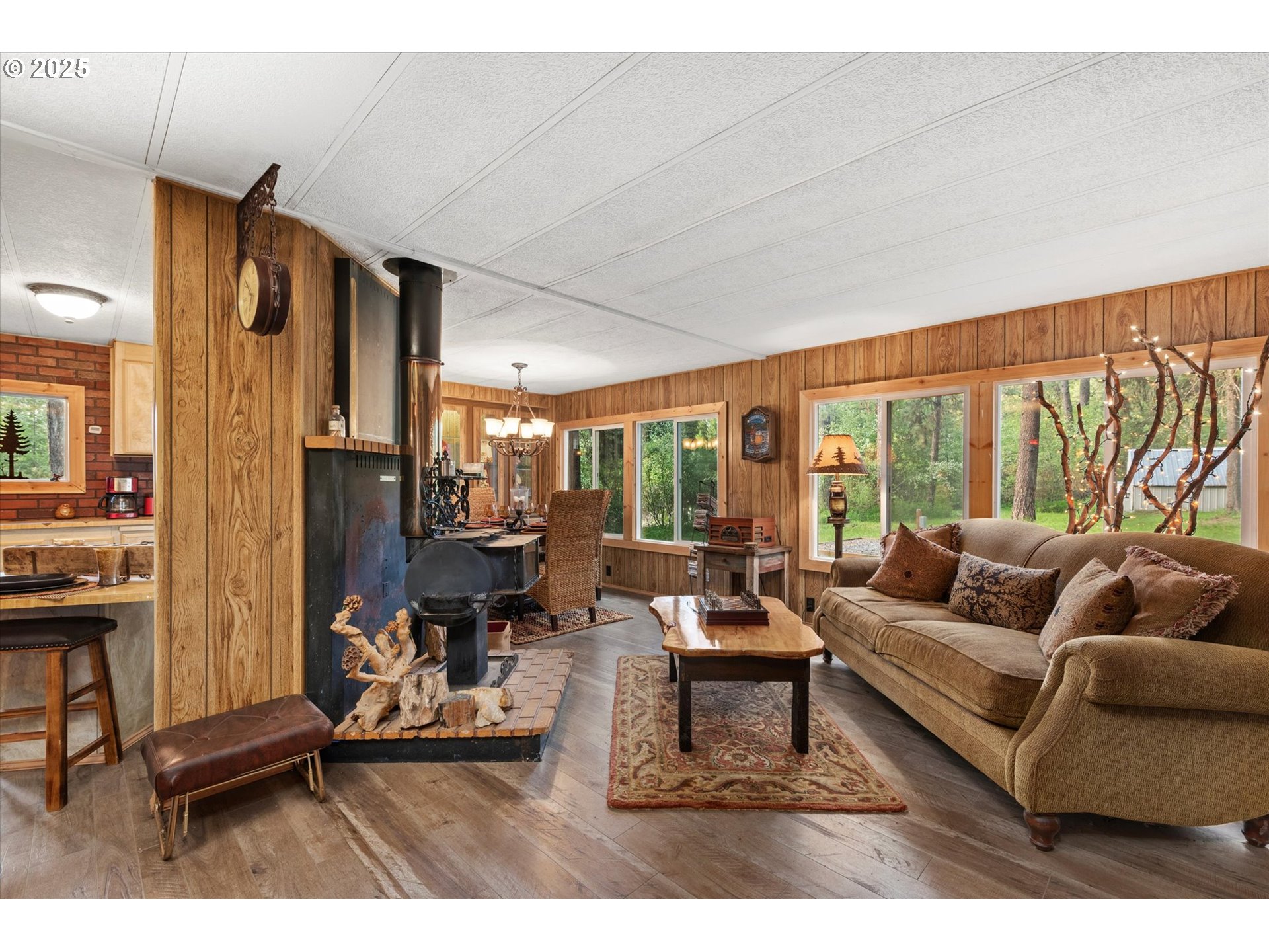 74576 Thompson Road Elgin, OR 97827 - Photo 26 of 47 a living room with furniture and large windows