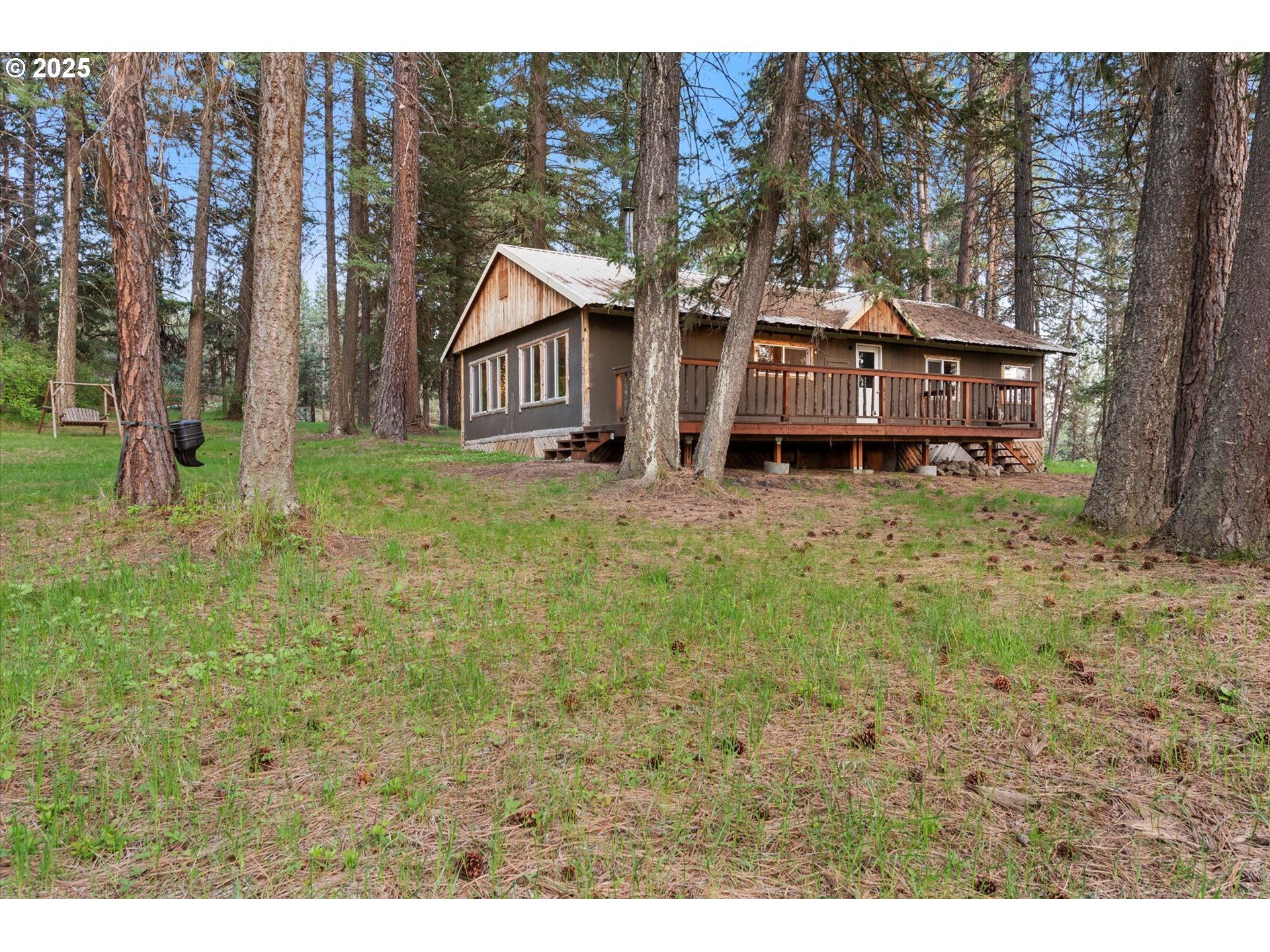 74576 Thompson Road Elgin, OR 97827 - Photo 9 of 47 a view of a house with a yard