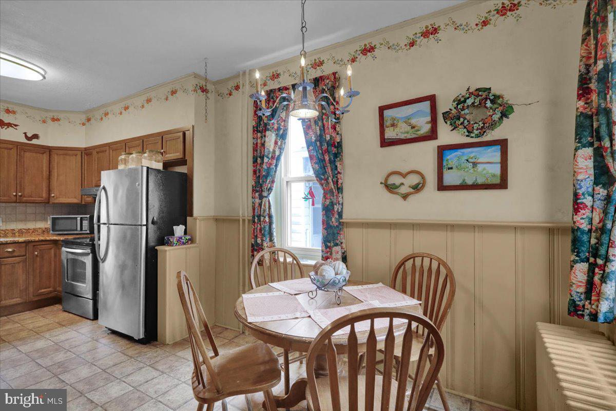 758 Fritztown Road Reading, PA 19608 - Photo 11 of 27 a view of a dining room with furniture