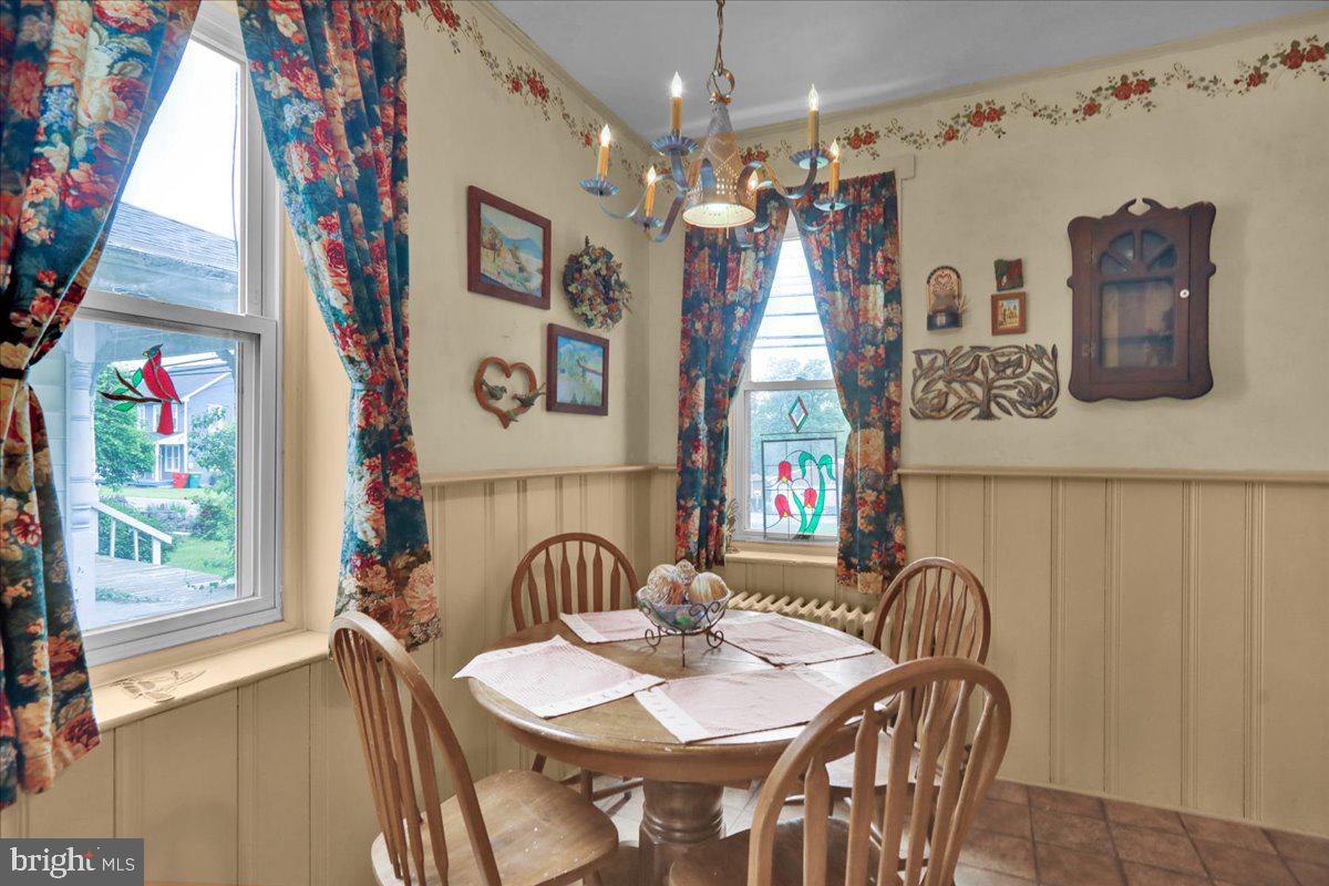 758 Fritztown Road Reading, PA 19608 - Photo 12 of 27 a view of a dining room with furniture and chandelier