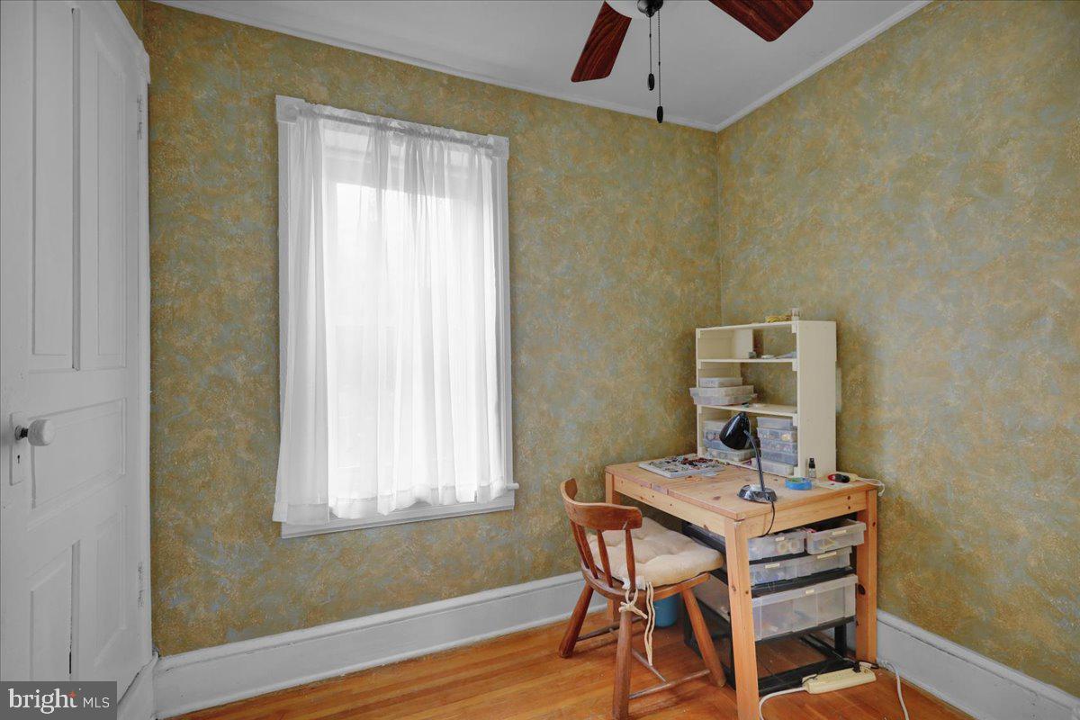 758 Fritztown Road Reading, PA 19608 - Photo 16 of 27 a view of a workspace with furniture and wooden floor