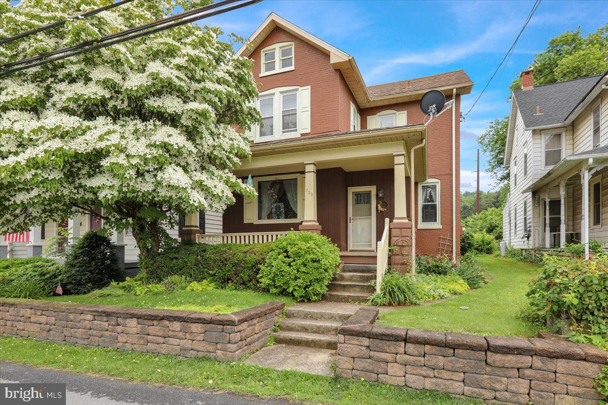 758 Fritztown Road Reading, PA 19608 - Photo 4 of 27 front view of a house with a yard