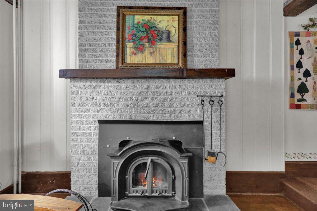 758 Fritztown Road Reading, PA 19608 - Photo 9 of 27 a living room with furniture and a fireplace