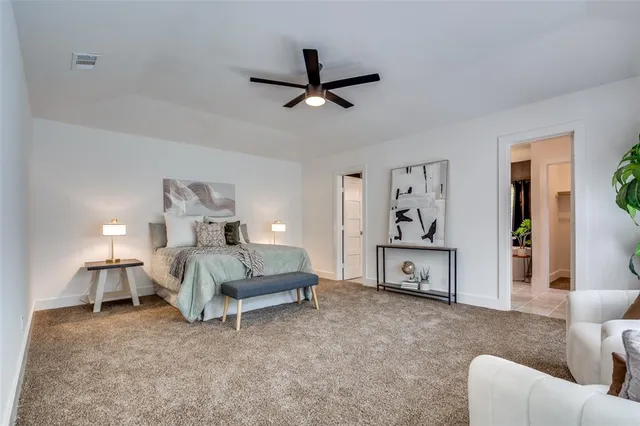 a bed room with a bed and a couch