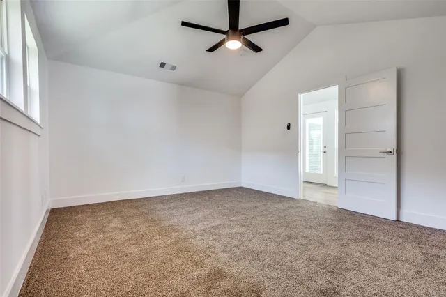 an empty room with fan