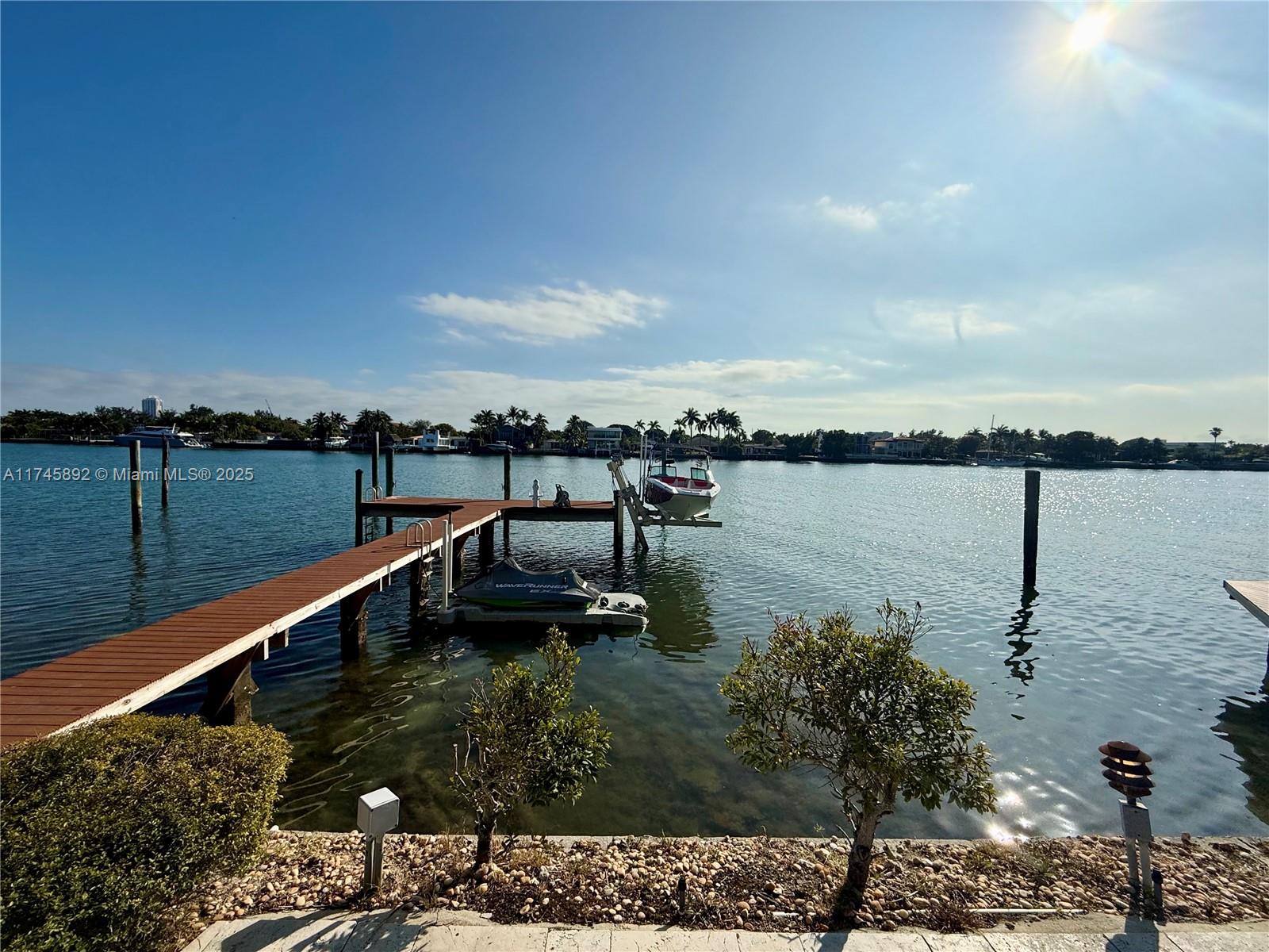 1670 Daytonia Road Miami Beach, FL 33141 - Photo 3 of 24 a view of a lake with a outdoor space