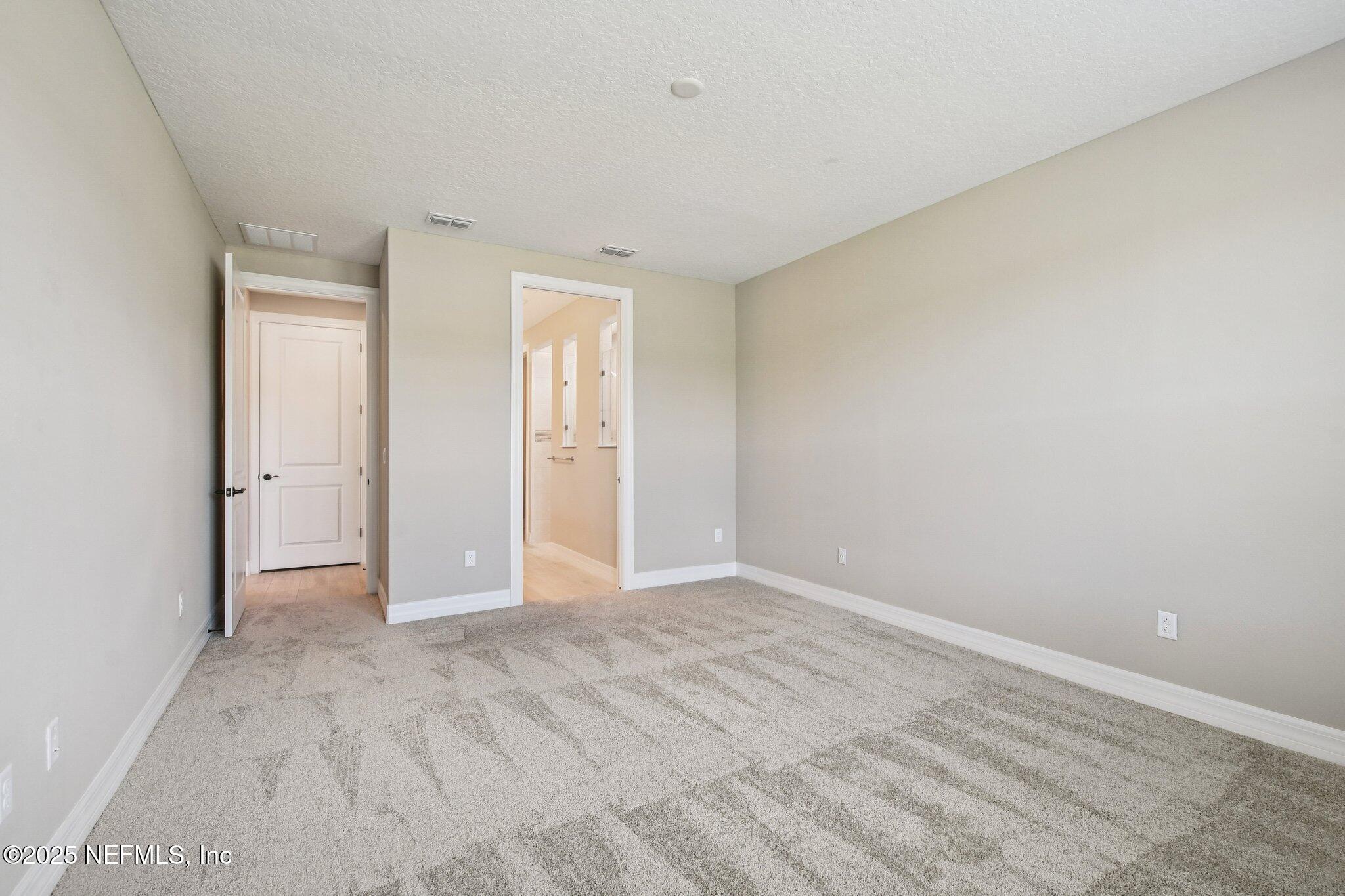 729 Continuum Loop Yulee, FL 32097 - Photo 17 of 31 a view of an empty room