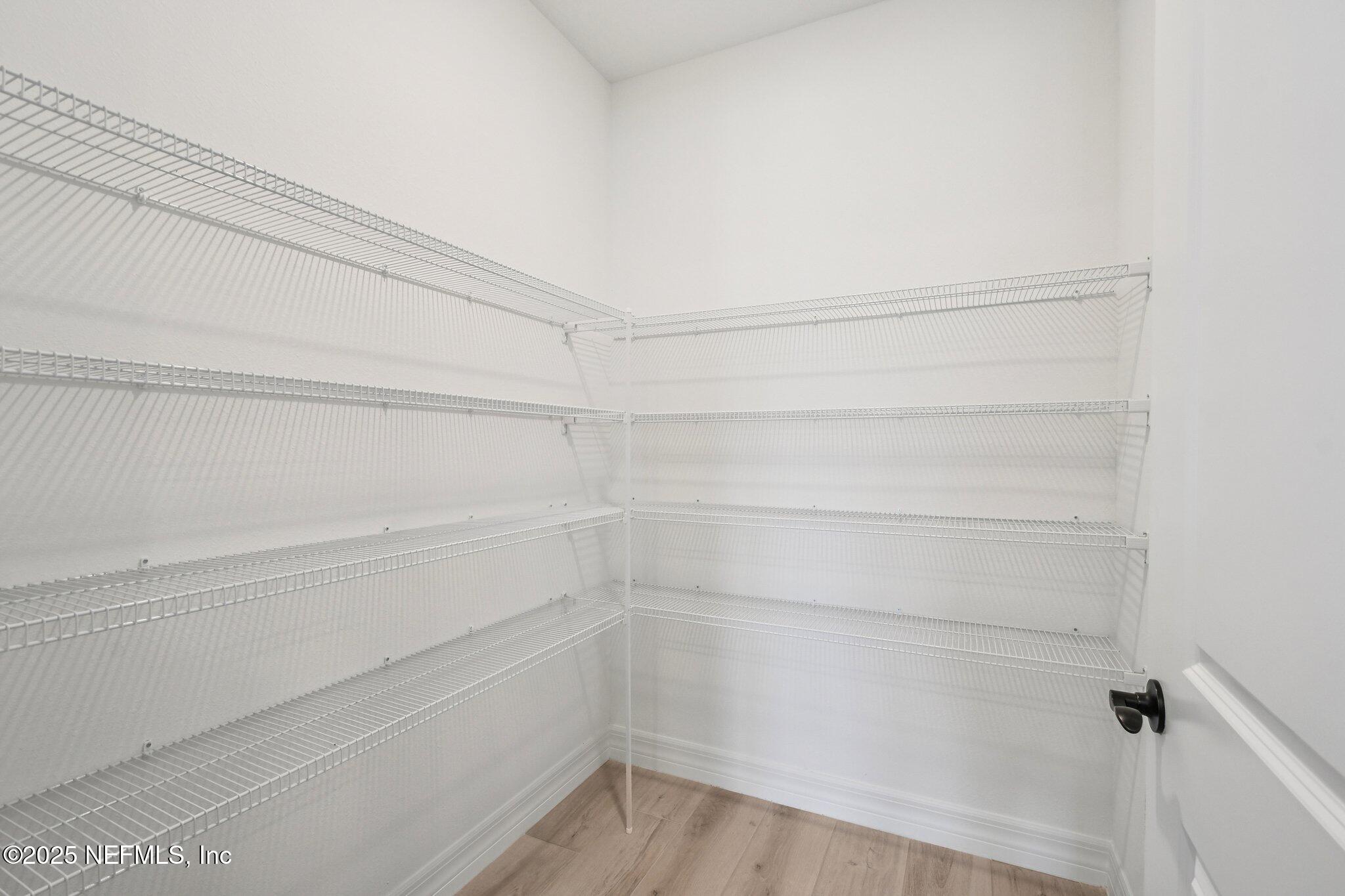 729 Continuum Loop Yulee, FL 32097 - Photo 25 of 31 a view of a closet