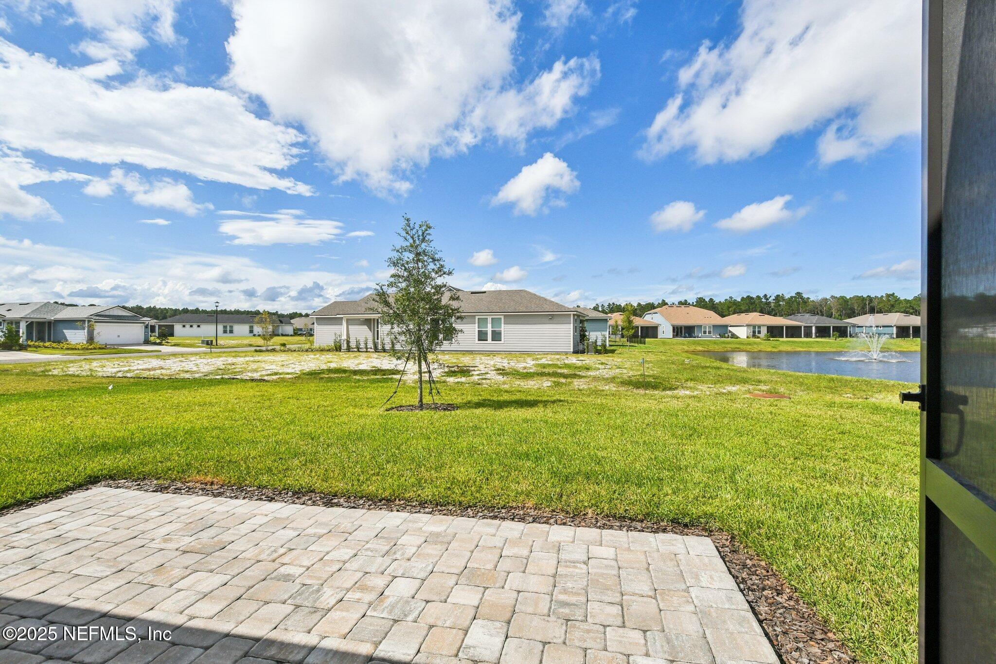729 Continuum Loop Yulee, FL 32097 - Photo 27 of 31 a view of a city with an ocean