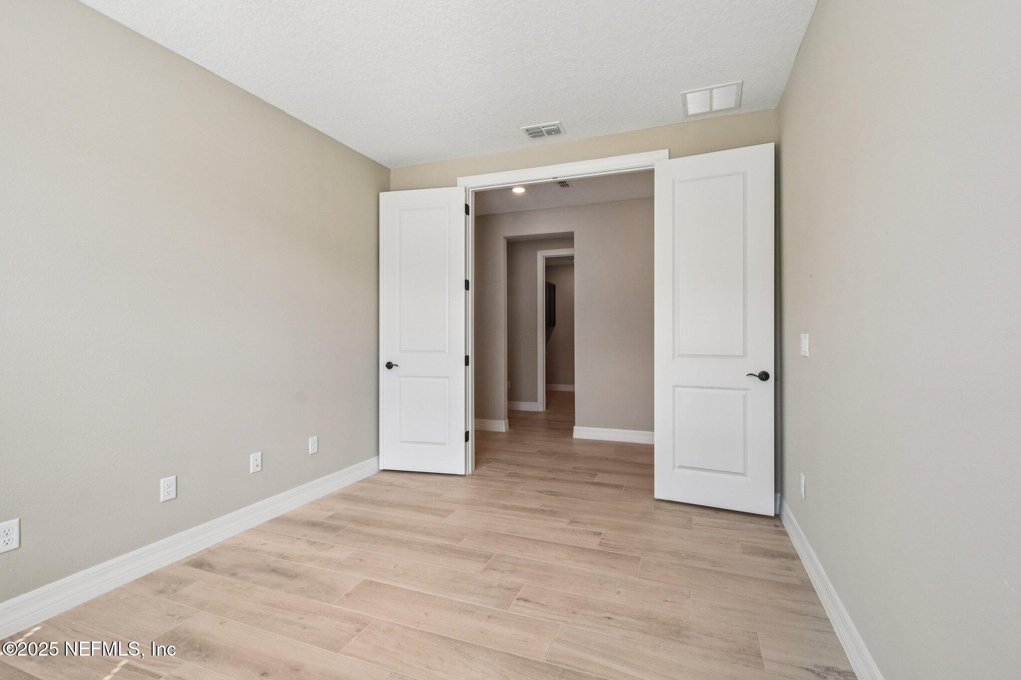 729 Continuum Loop Yulee, FL 32097 - Photo 5 of 31 a view of an empty room
