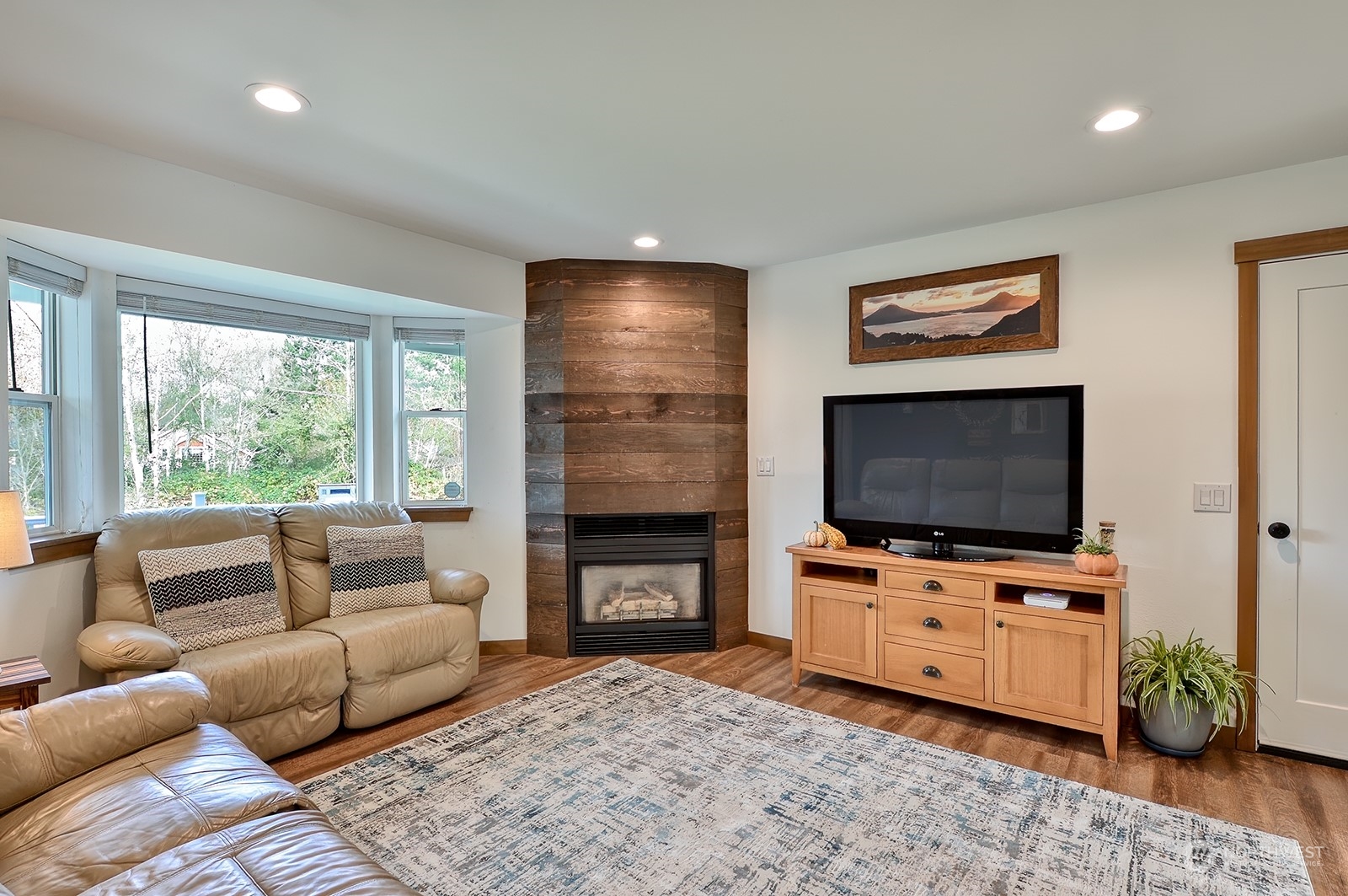 3978 Roma Court Bellingham, WA 98226 - Photo 27 of 38 a living room with furniture and a flat screen tv