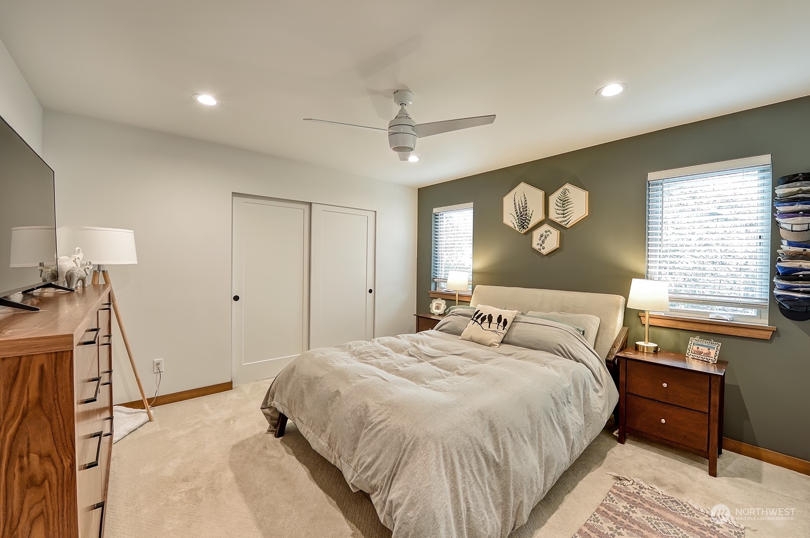 3978 Roma Court Bellingham, WA 98226 - Photo 29 of 38 a bedroom with a bed and a chandelier