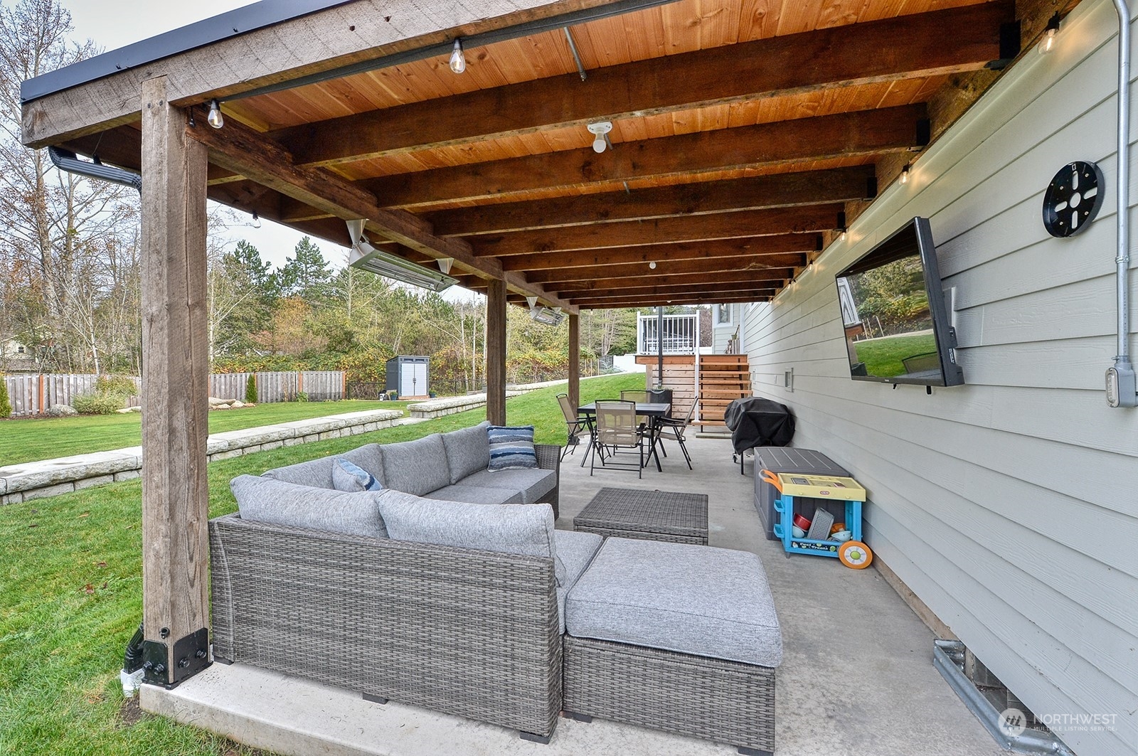 3978 Roma Court Bellingham, WA 98226 - Photo 33 of 38 a view of a patio with couches chairs and a big yard