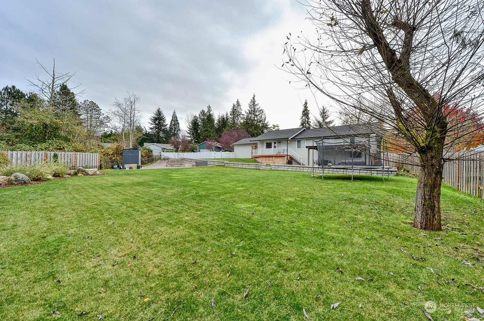 3978 Roma Court Bellingham, WA 98226 - Photo 37 of 38 a view of a house with a back yard