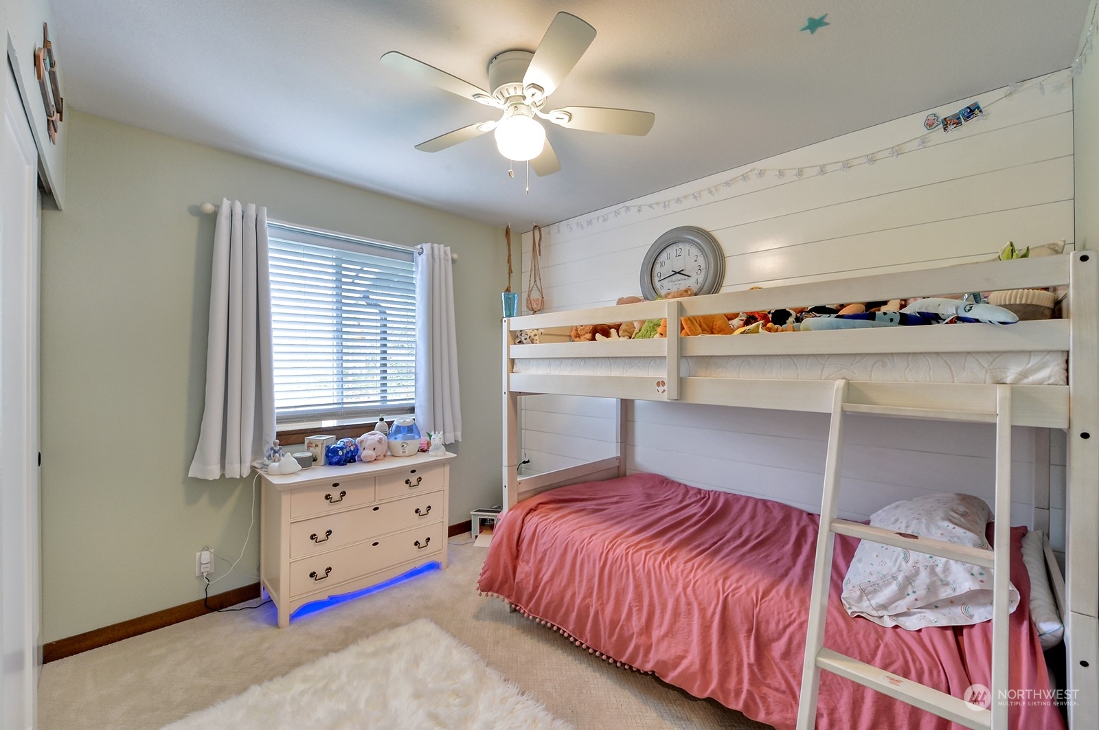 3978 Roma Court Bellingham, WA 98226 - Photo 8 of 38 a bedroom with a bed and a chandelier