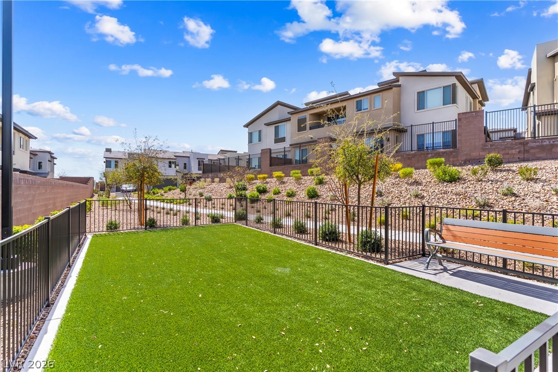 633 Infinity Rdg Street Las Vegas, NV 89138 - Photo 24 of 30 View of yard featuring a residential view
